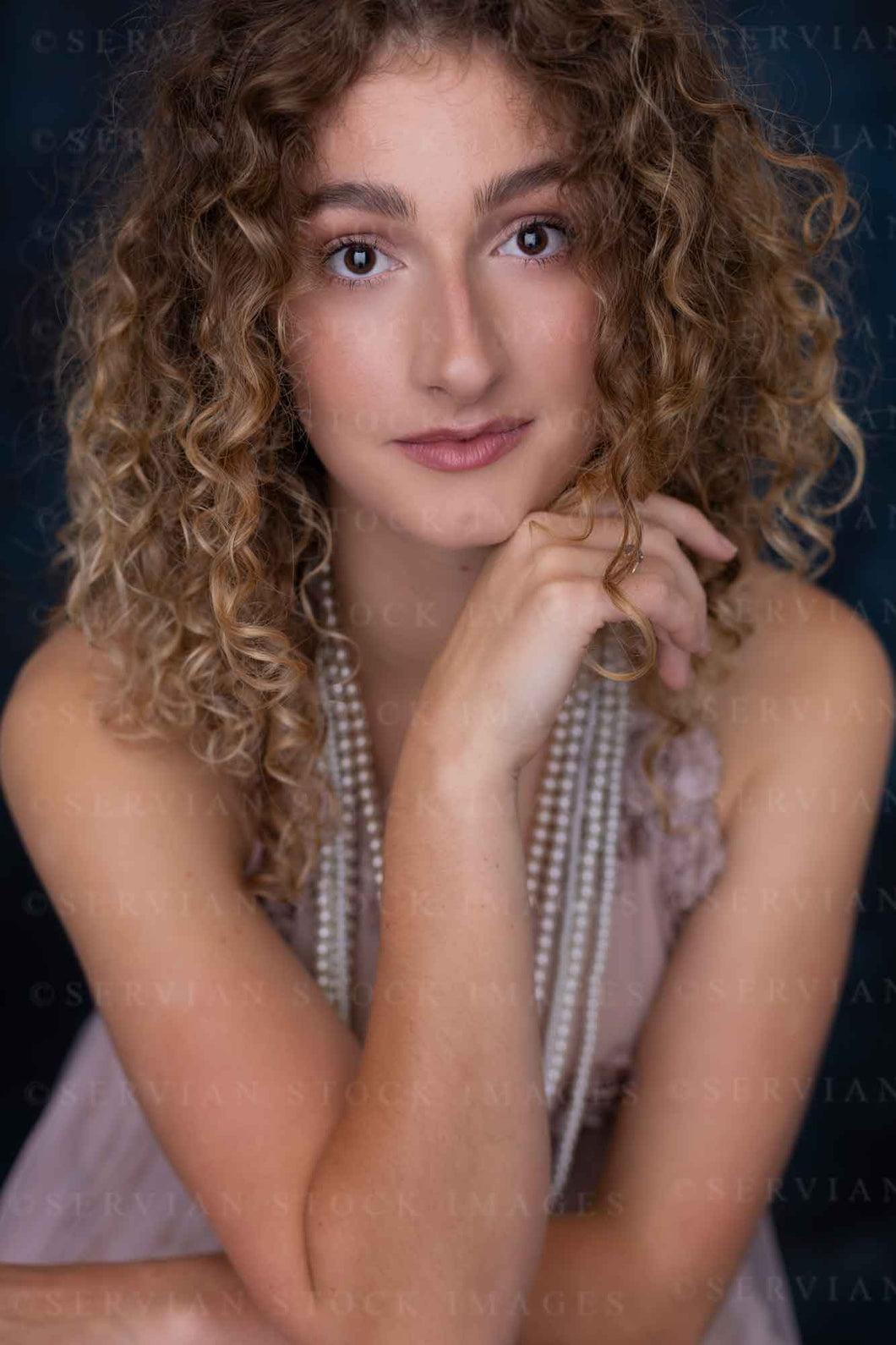 Contemporary woman with curly hair and pearl necklaces  (Sav 0413)