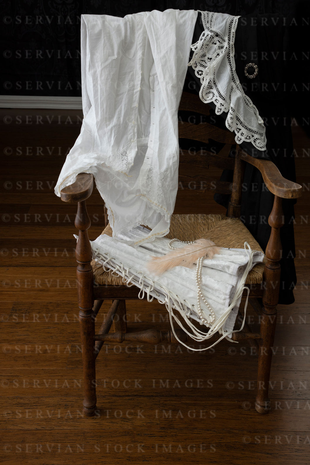 Still life -  Vintage clothes on a wooden chair  (KS0577)