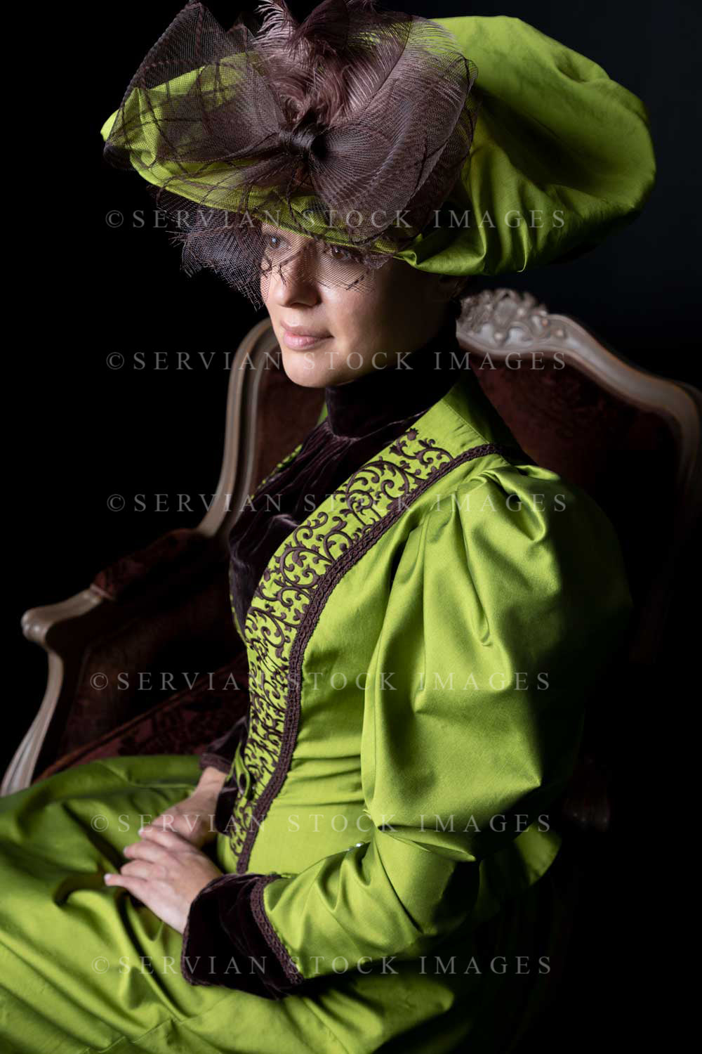 Victorian woman in green silk ensemble (Emma 2022)