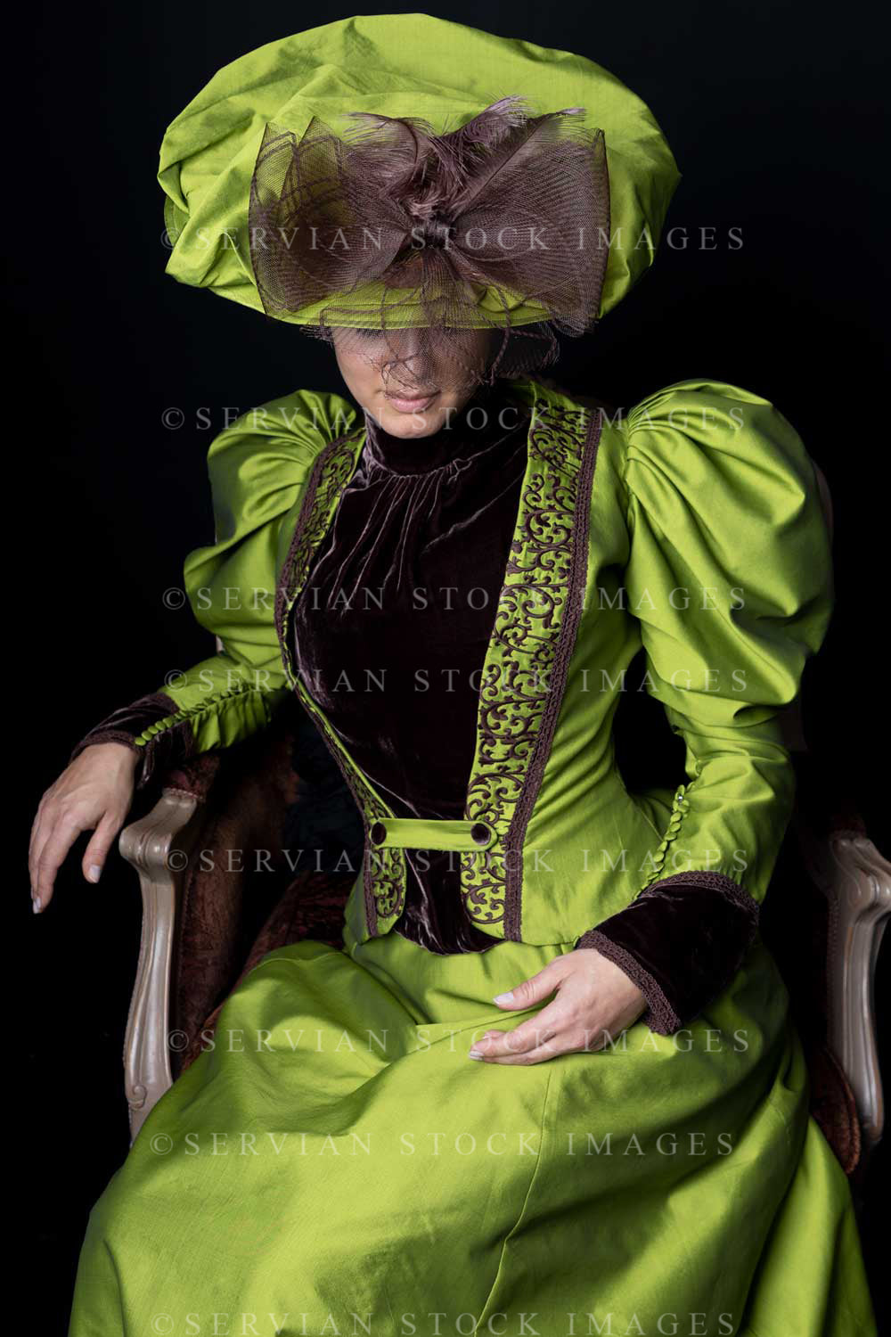 Victorian woman in green silk ensemble (Emma 2212)