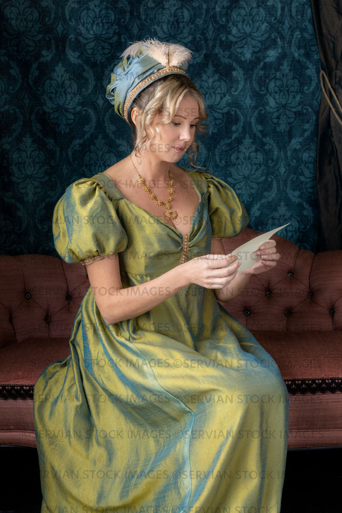Regency woman wearing a green shot silk dress and turban (Sherilyn 2689)