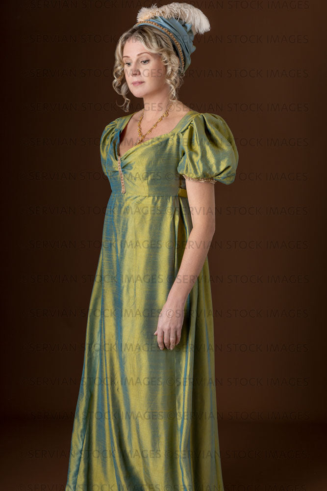 Regency woman wearing a green shot silk dress and turban (Sherilyn 2701)
