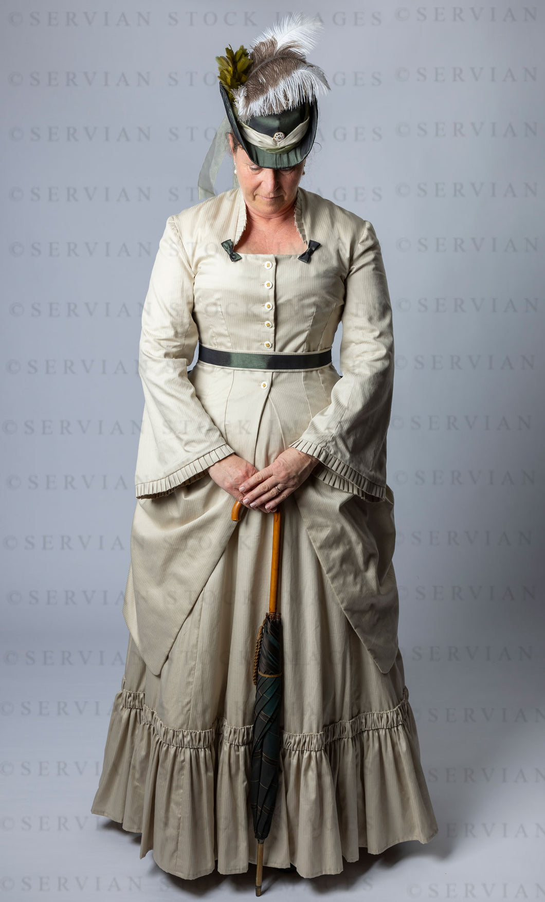 Victorian woman in a bustle ensemble (Tracey 2870)