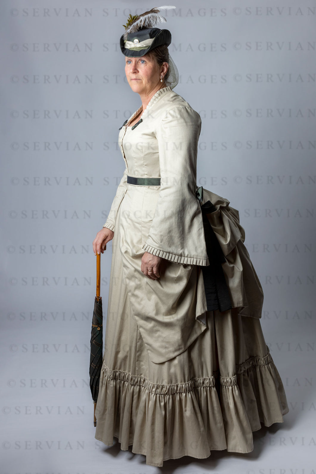 Victorian woman in a bustle ensemble (Tracey 2881)