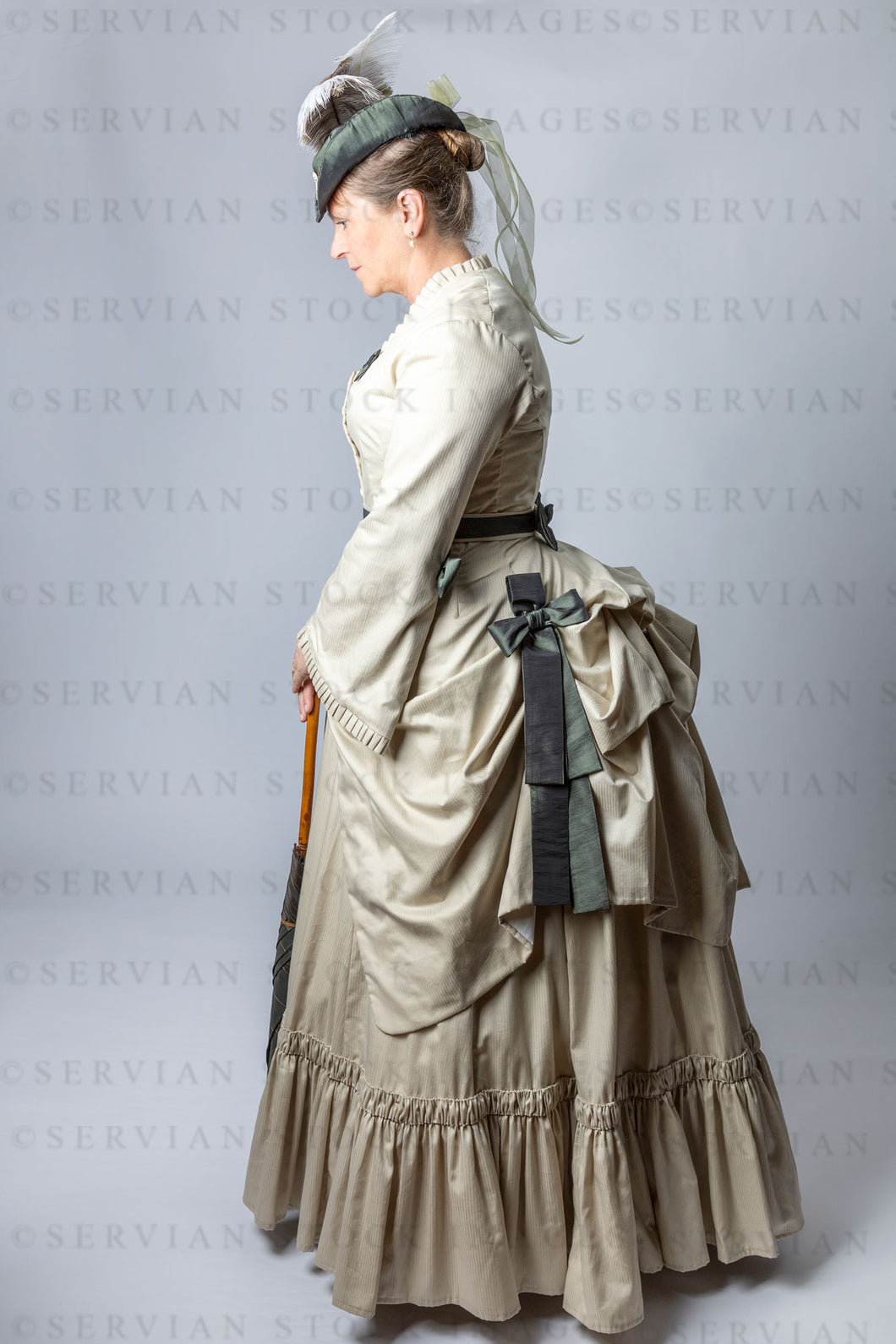 Victorian woman in a bustle ensemble (Tracey 2886)