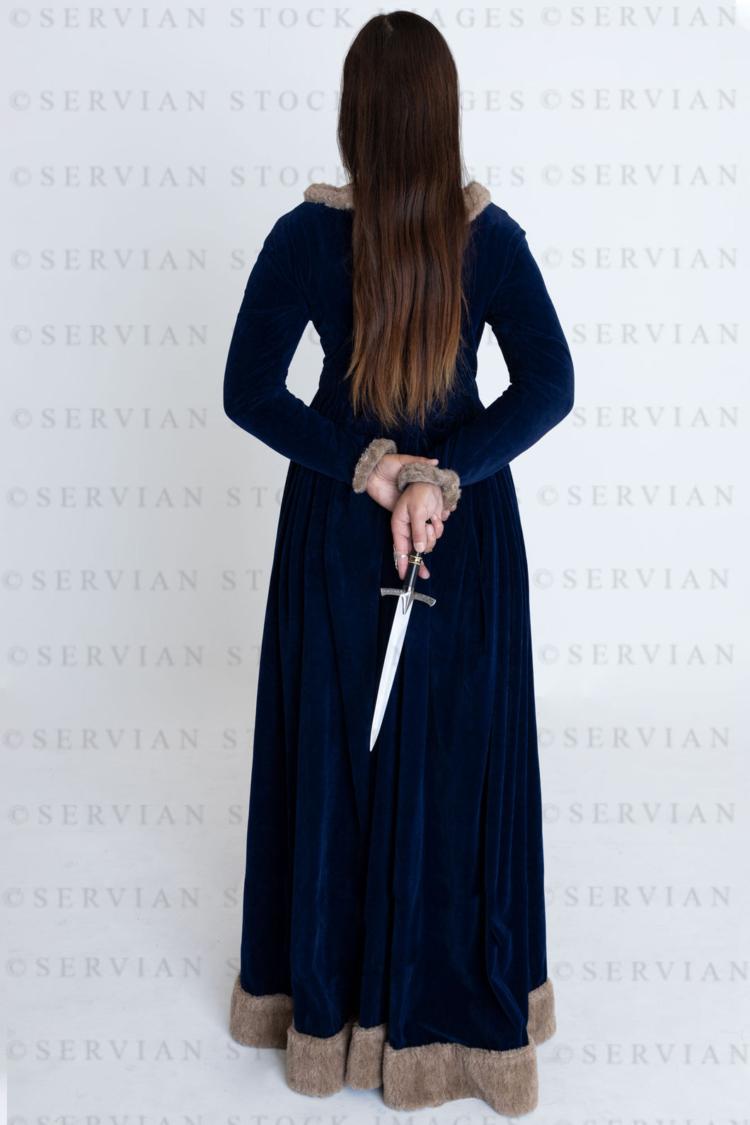 Medieval or high fantasy woman wearing a velvet dress and holding a dagger (Sylvia 3319)