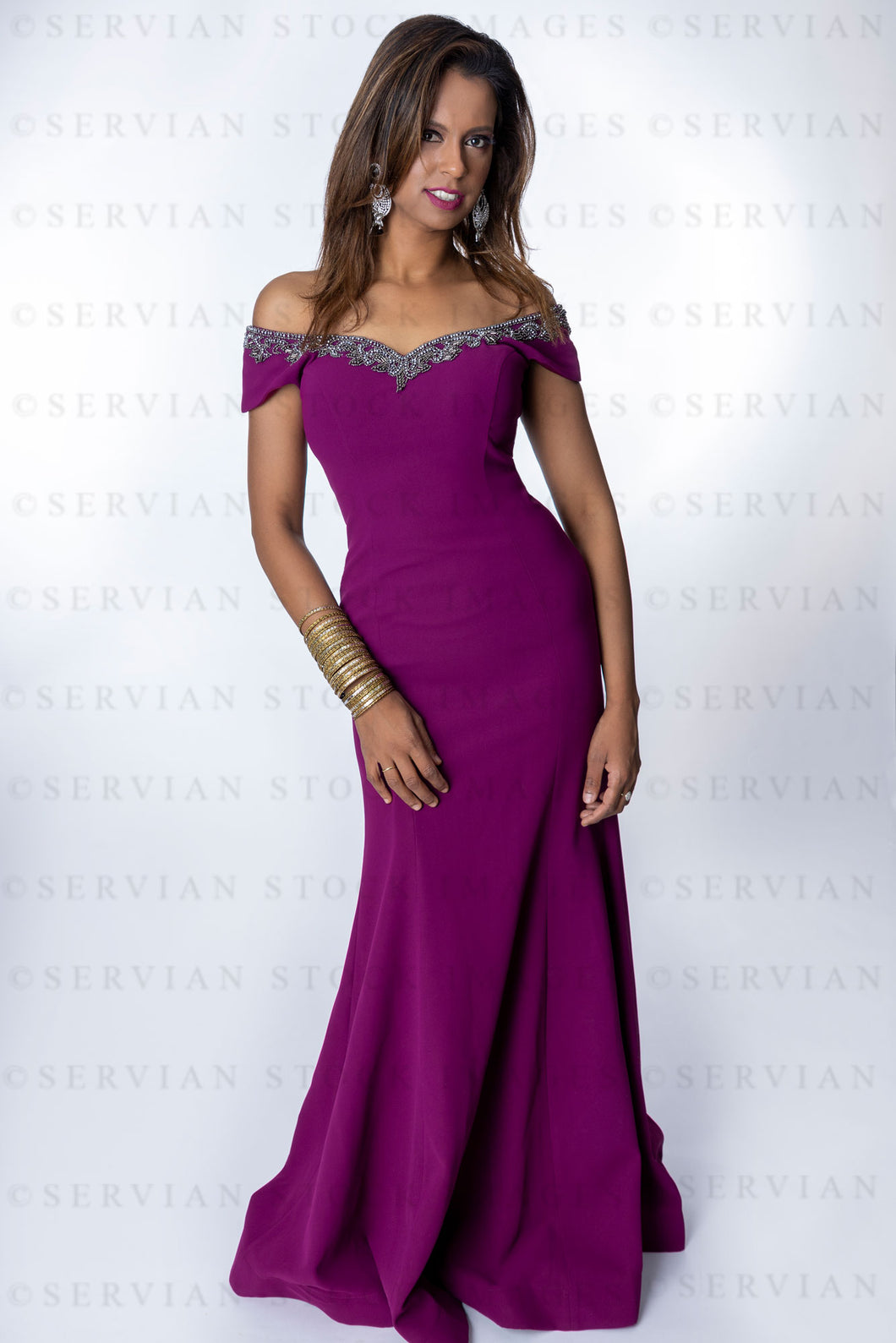 Contemporary woman wearing a fitted evening dress (Shelaila 3339 )
