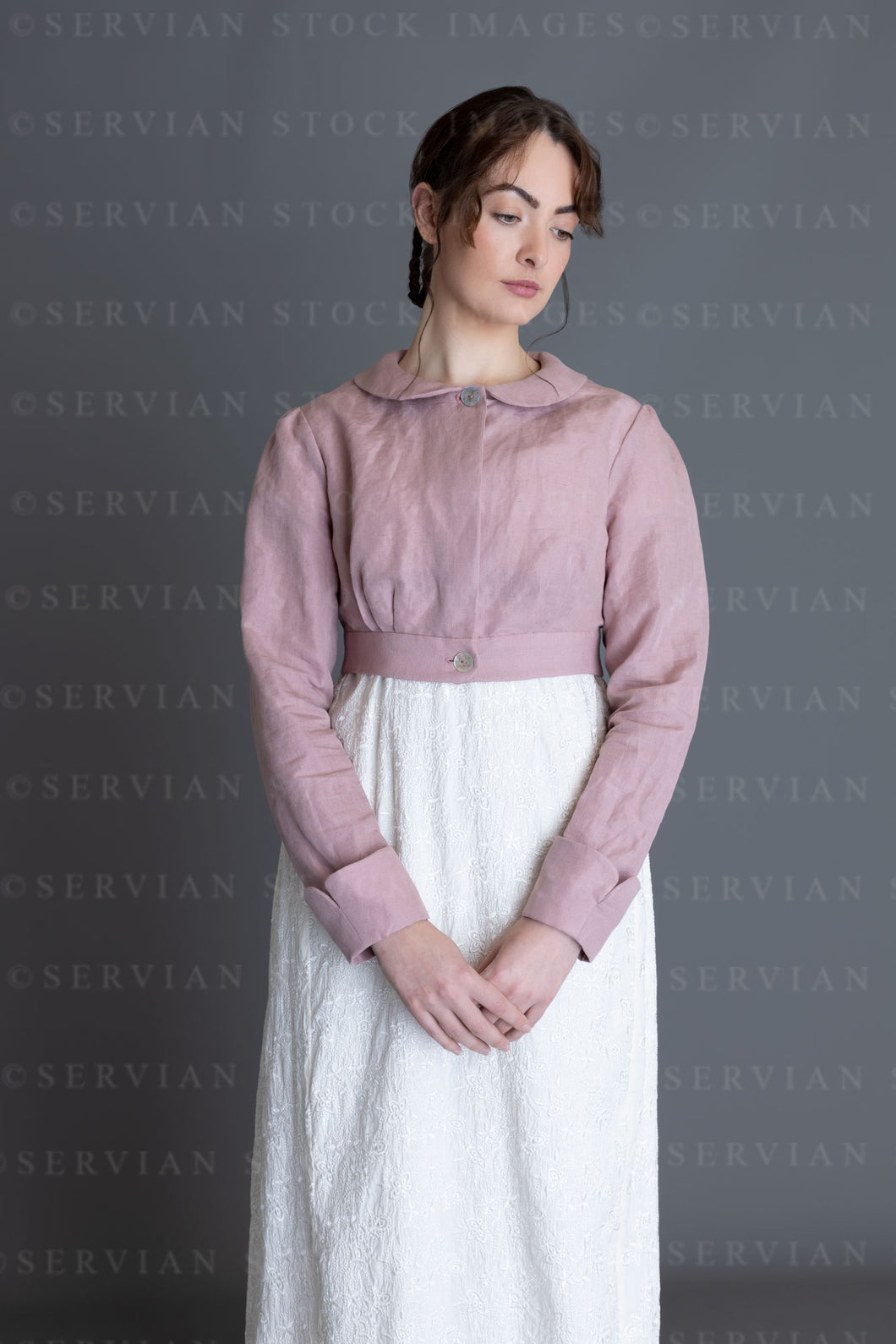 Regency woman in a cream embroidered dress and pink linen short spencer (Clarese 3452)