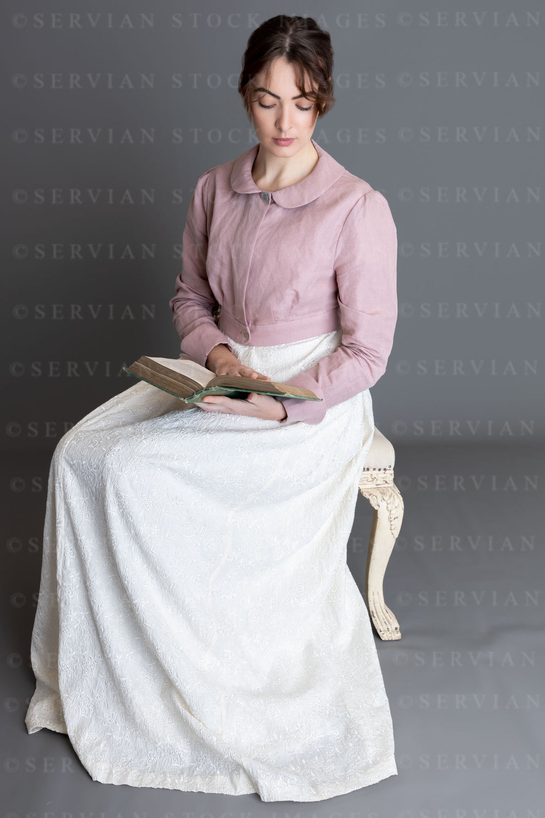 Regency woman in a cream embroidered dress and pink linen short spencer (Clarese 3510)