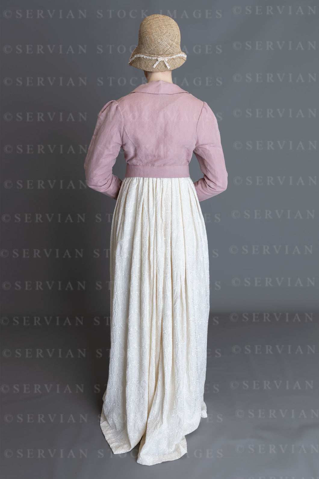 Regency woman in a cream embroidered dress and pink linen short spencer (Clarese 3568)