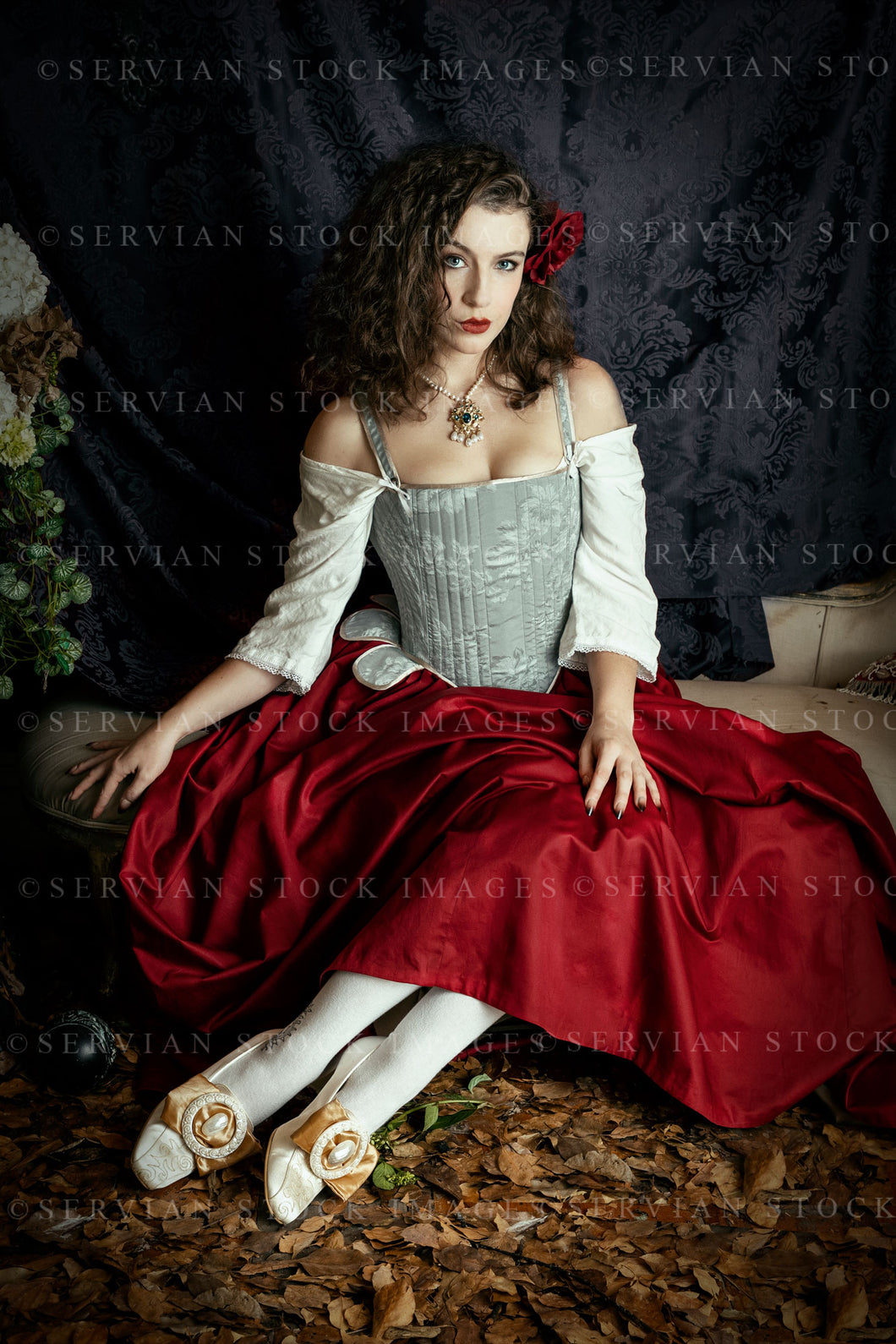 Renaissance woman wearing a brocade corset and red skirt (Victoria 4159)