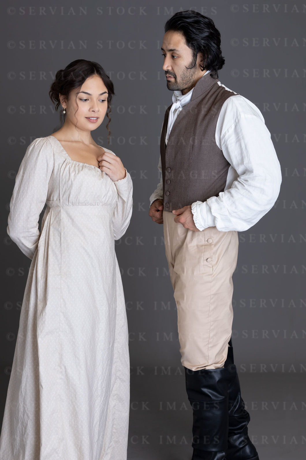 Regency couple against a grey backdrop (Sophia and Ramzi 4350)