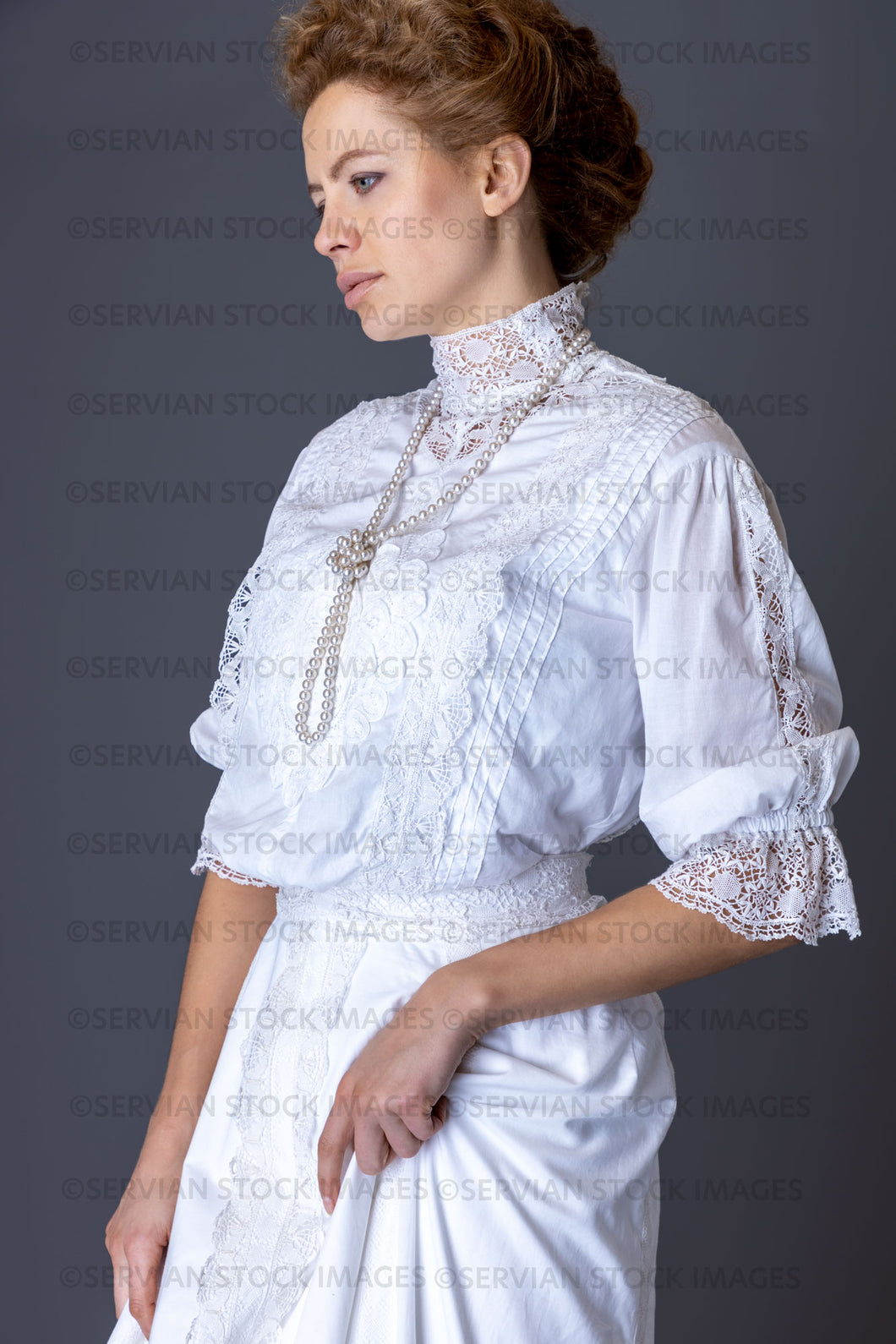 Edwardian woman in a white lace blouse and skirt with a pearl necklace (Anastasiya 4794)