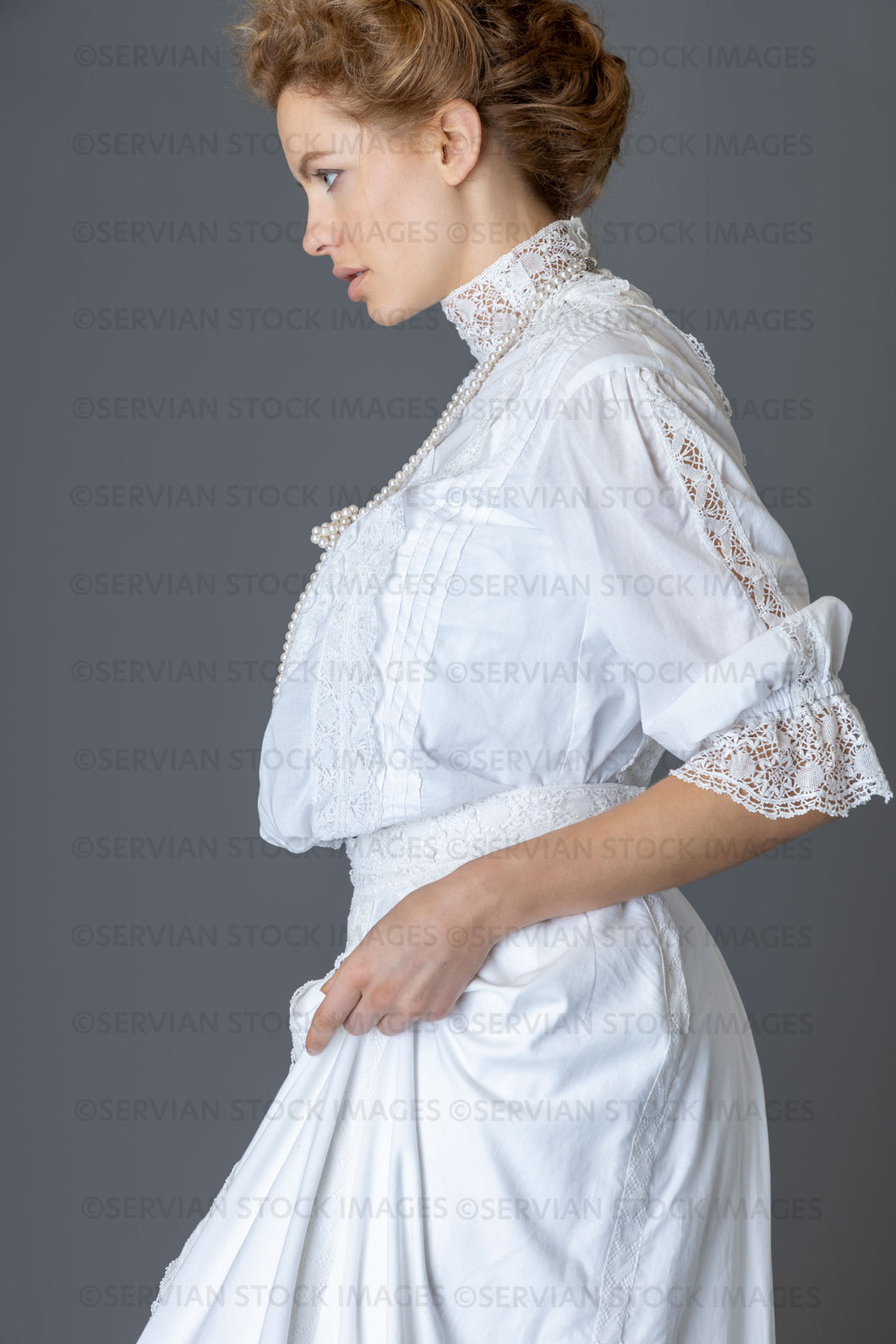 Edwardian woman in a white lace blouse and skirt with a pearl necklace (Anastasiya 4809)