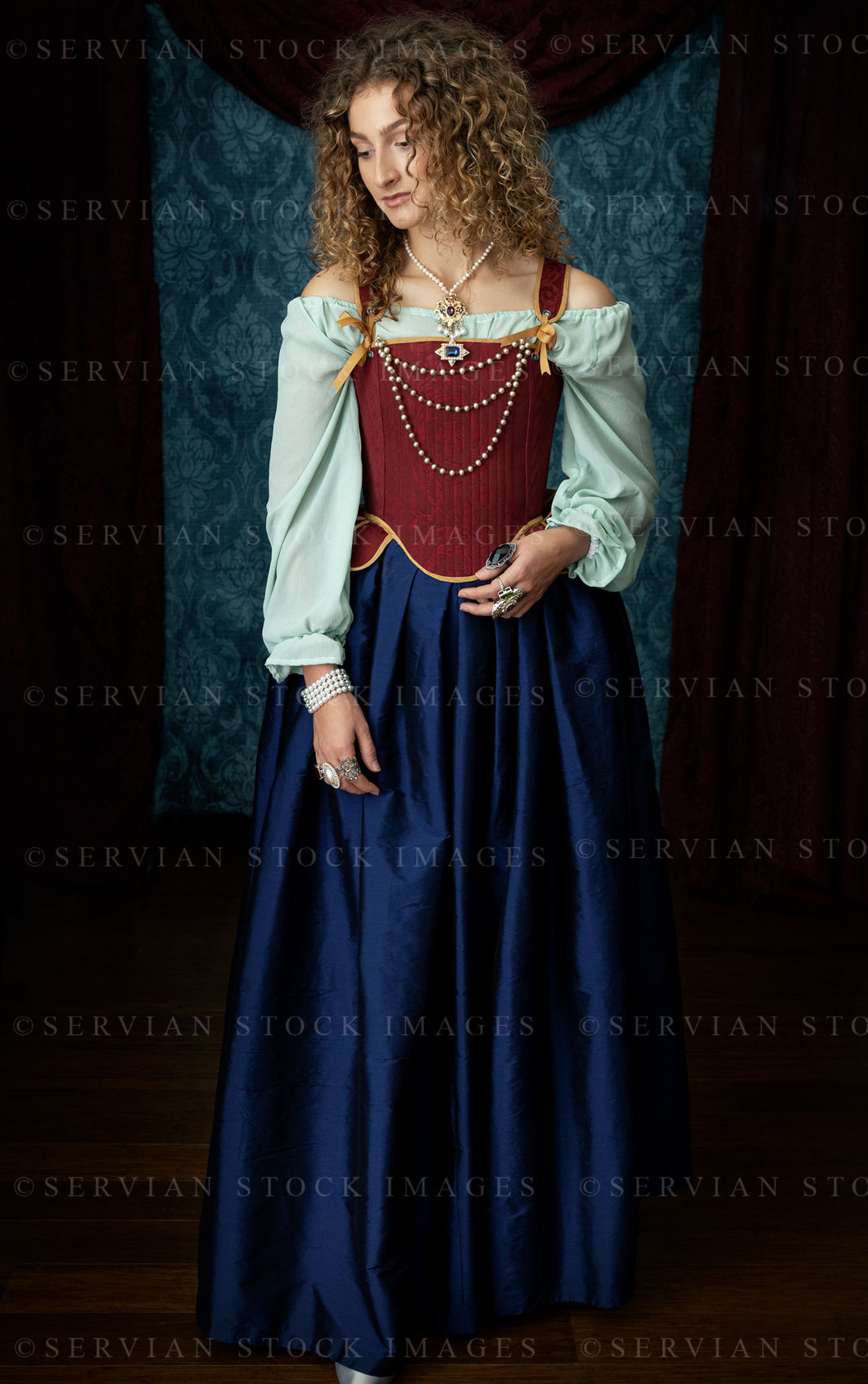 Renaissance or Georgian woman in a red brocade corset and blue silk skirt (Sav 5211)