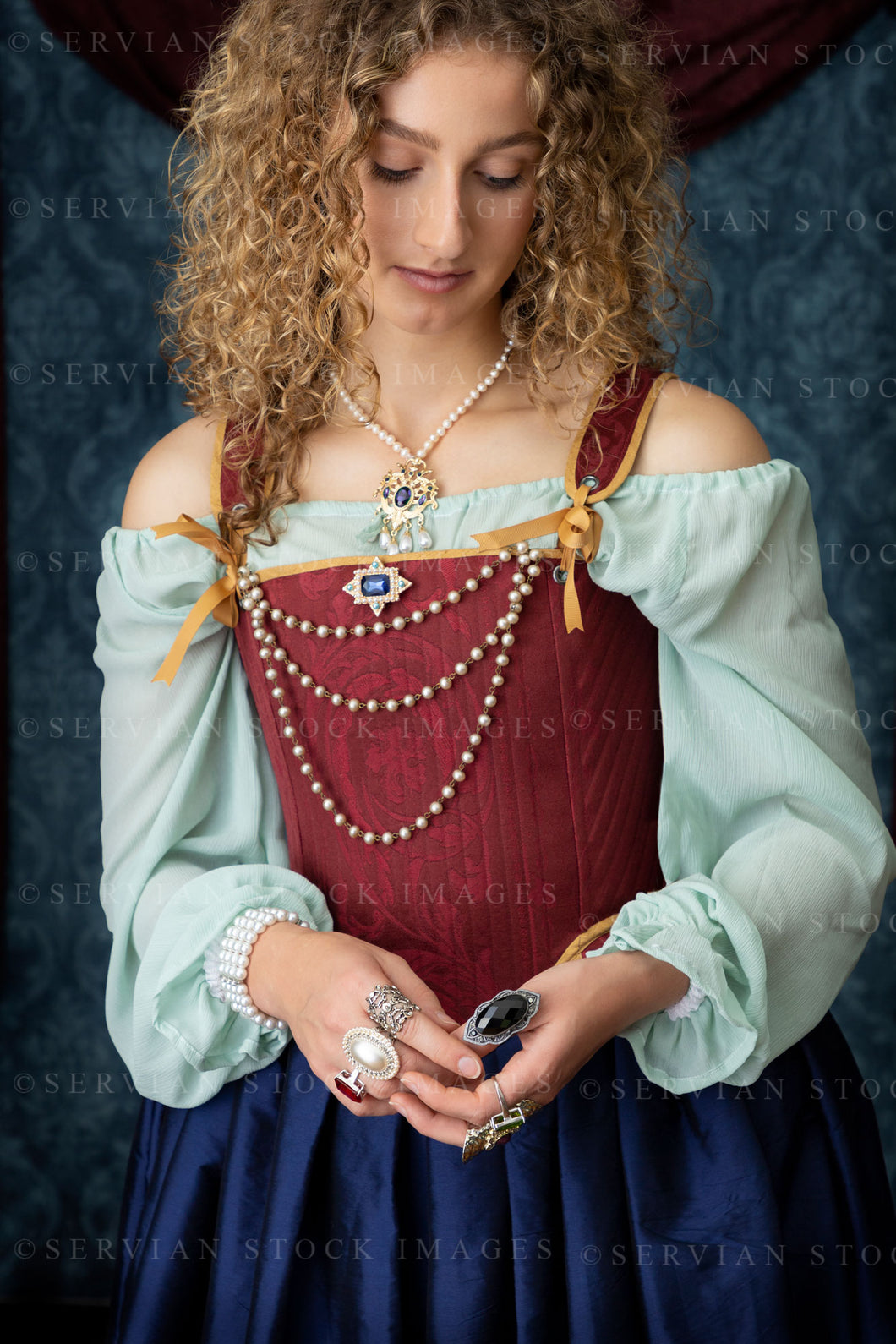 Renaissance or Georgian woman in a red brocade corset and blue silk skirt (Sav 5216)
