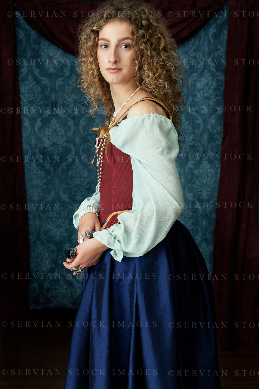 Renaissance or Georgian woman in a red brocade corset and blue silk skirt (Sav 5221)