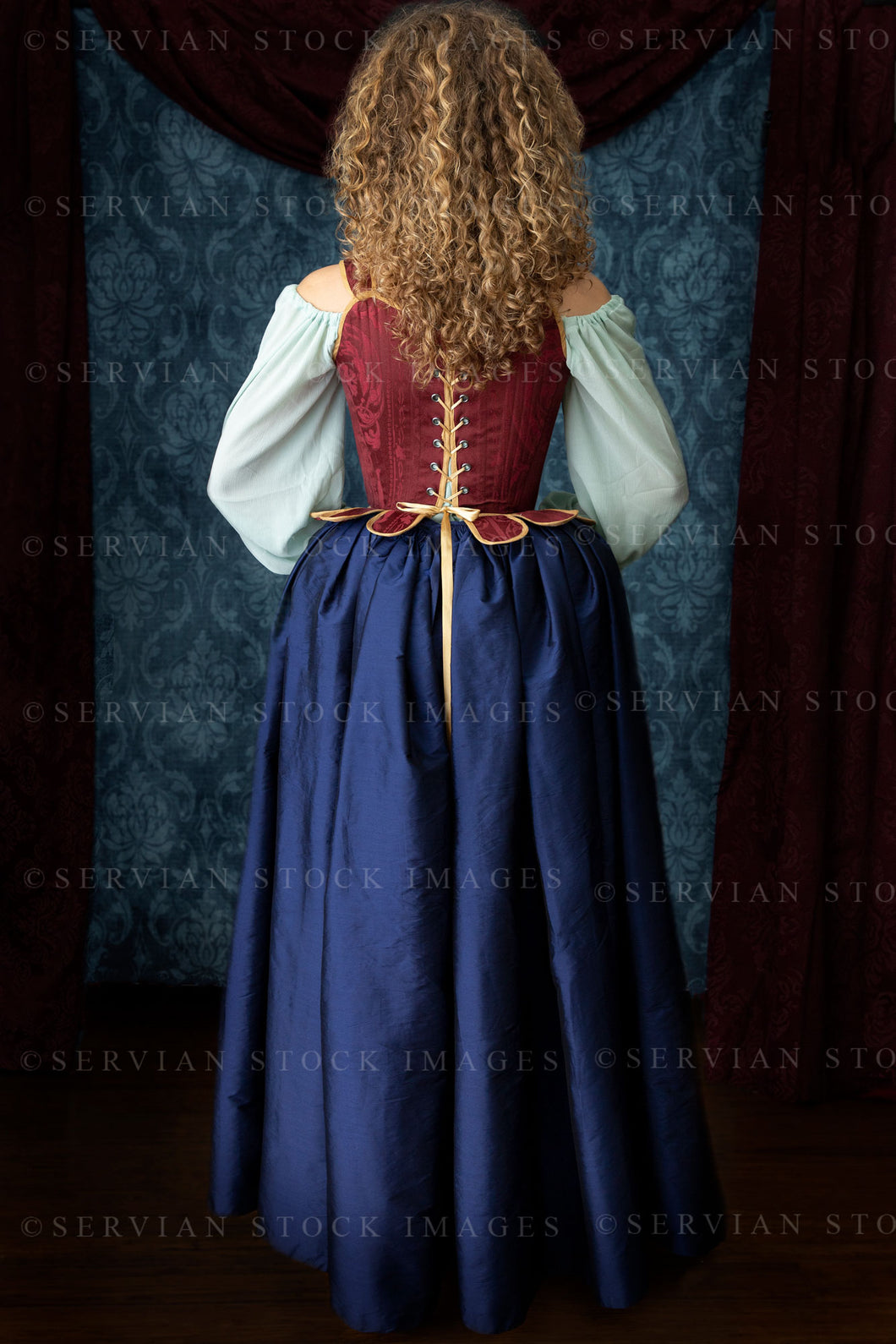 Renaissance or Georgian woman in a red brocade corset and blue silk skirt (Sav 5228)
