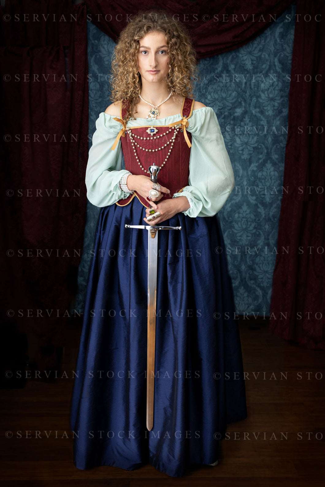 Renaissance or Georgian woman in a red brocade corset and blue silk skirt (Sav 5240)