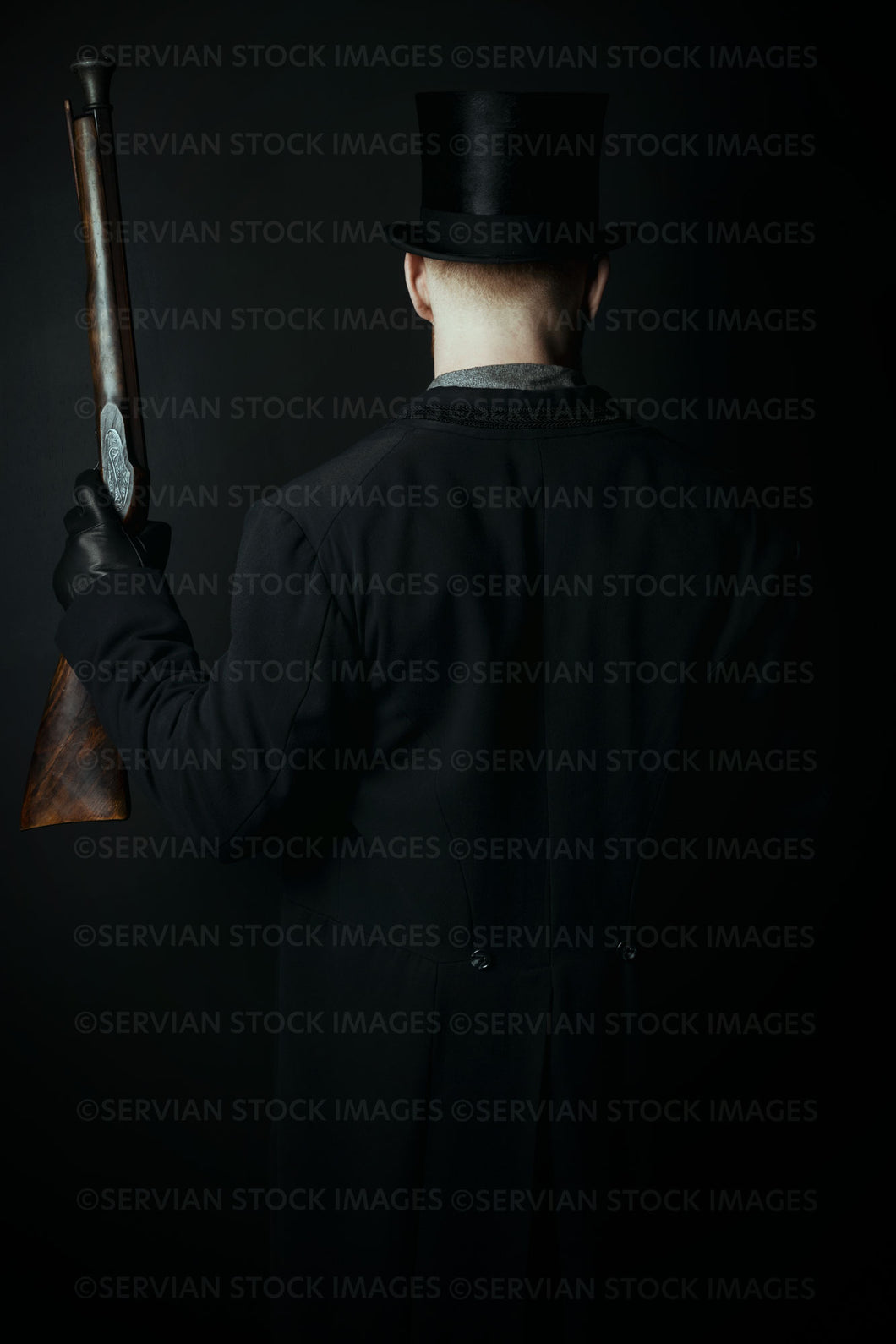 Victorian man wearing a top hat and holding a gun (Luke 5287)