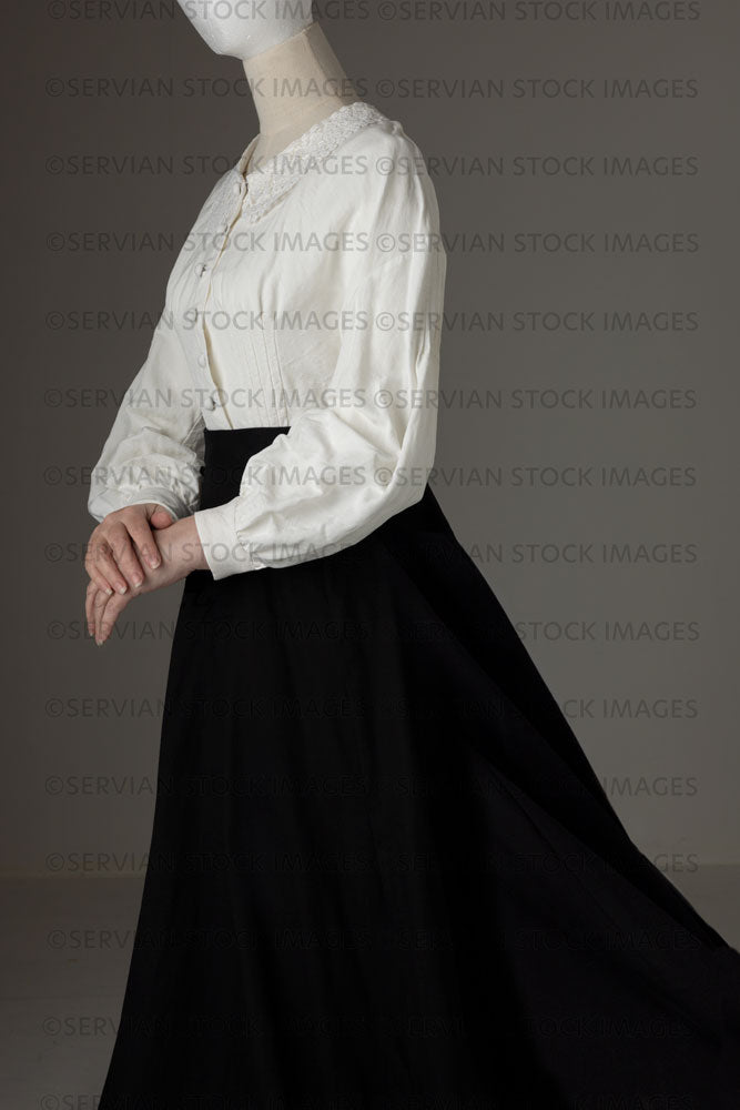 Mannequin with human hands wearing a Victorian Garibaldi blouse and black skirt (add your own human head)  (Quinn  5515
