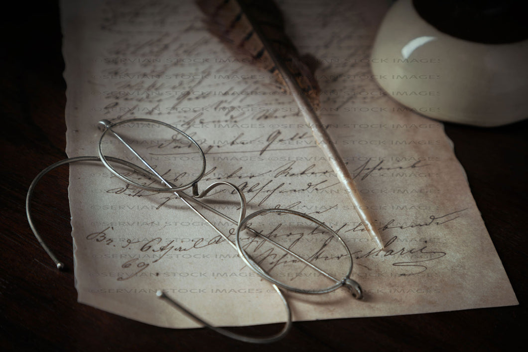 Still life -   Quill and vintage glasses on a written page (KS5752)