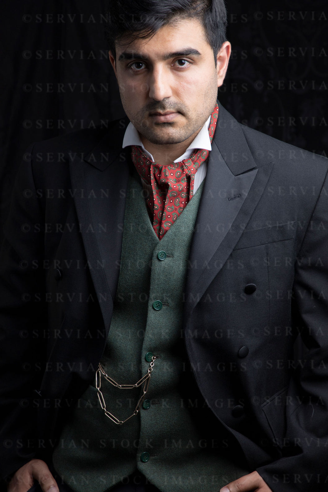 Victorian gentleman wearing a green waistcoat and red cravat (Mansoor 6101)
