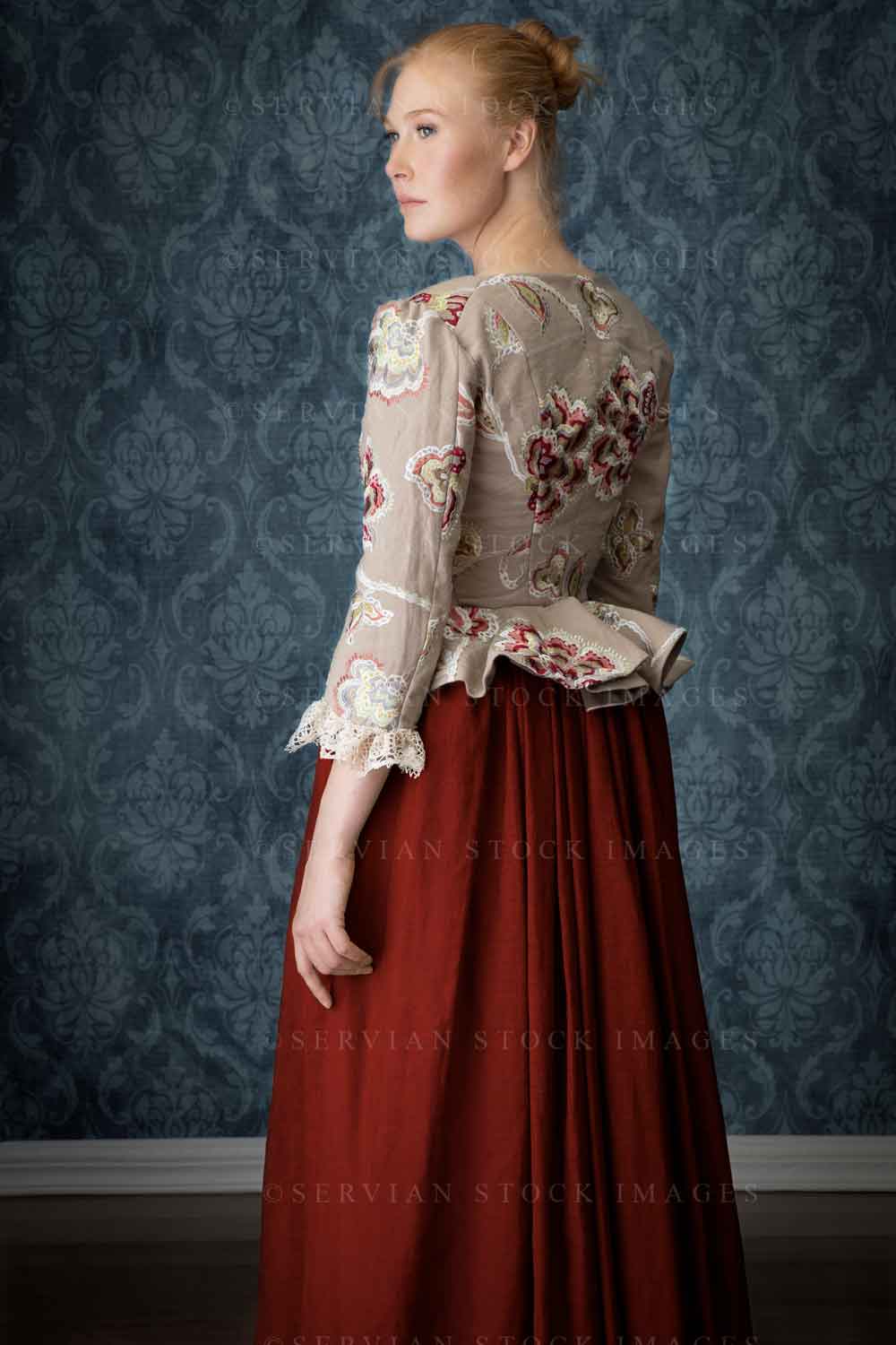 Renaissance woman in an embroidered bodice and red skirt (Lauren 7289)