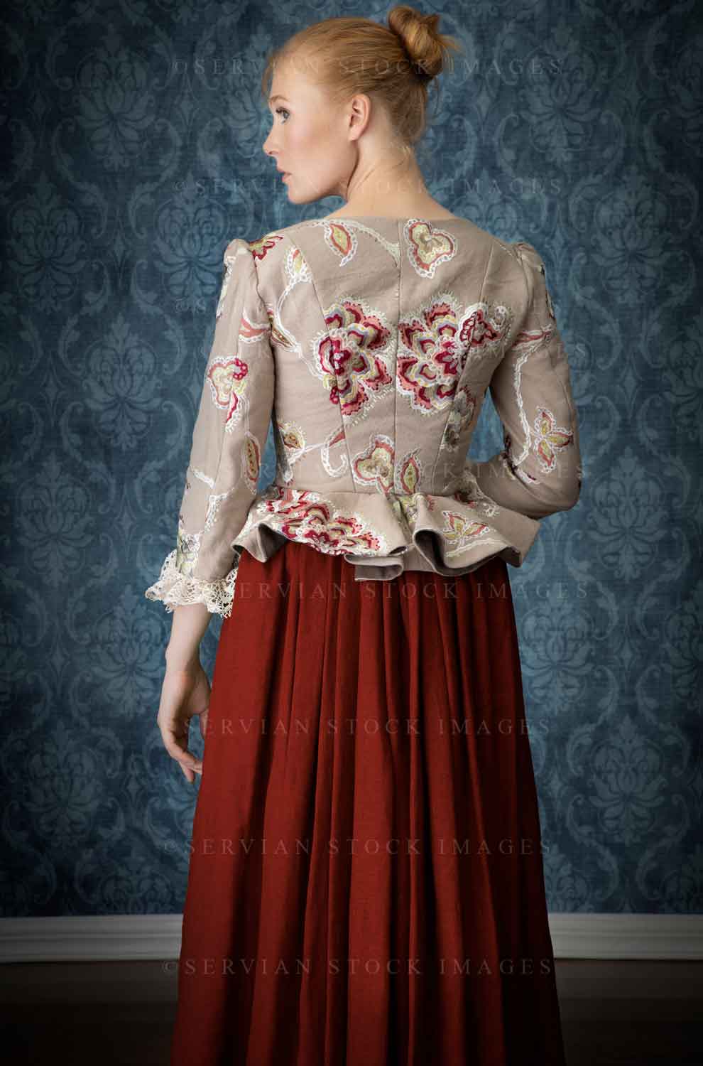 Renaissance or Georgian woman in an embroidered bodice and red skirt (Lauren 7299)