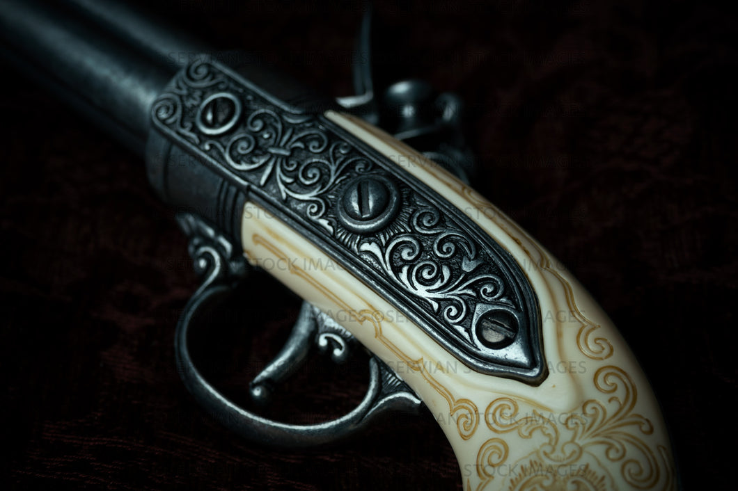 Still life -  Flintlock pistol on embossed red velvet  (KS 7400)
