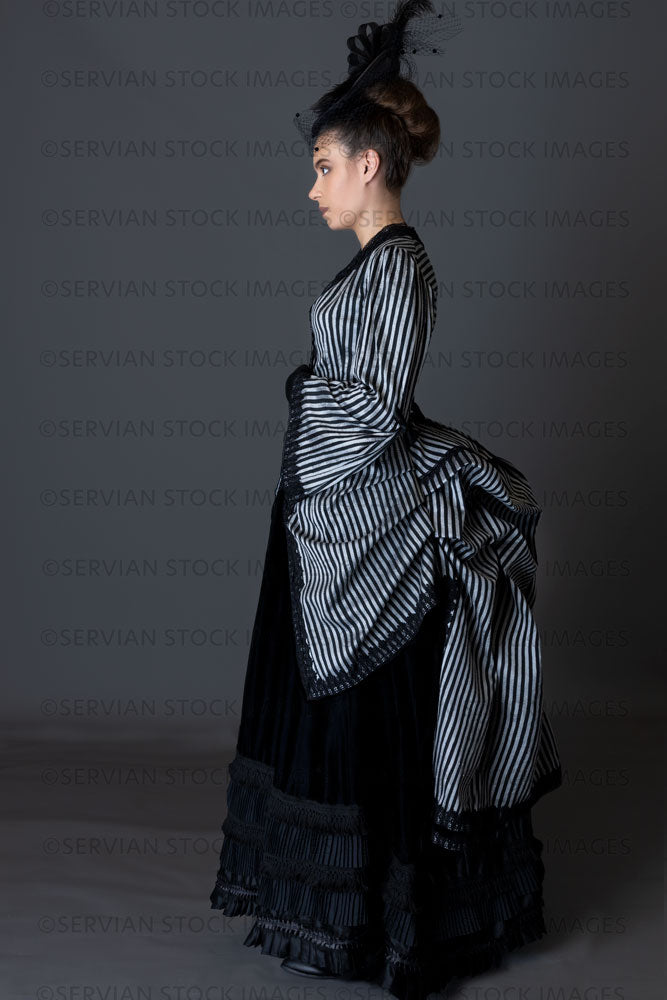Victorian woman in a striped silk 1870s bustle ensemble  (Sarah 8803)