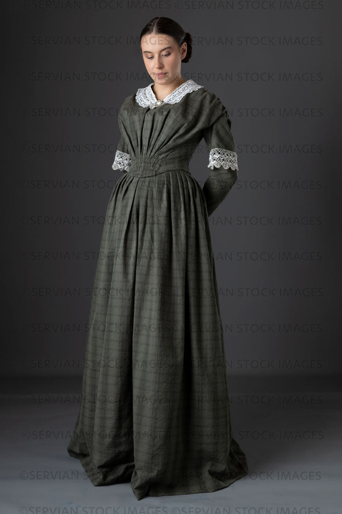 Victorian working class woman in dark green bodice and skirt (Sarah 1126)