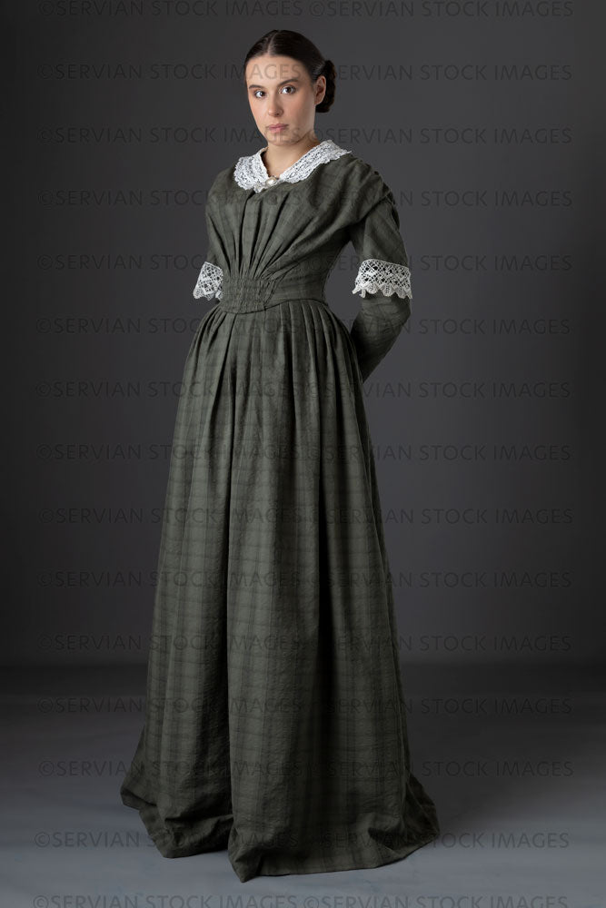Victorian working class woman in dark green bodice and skirt (Sarah 1128)