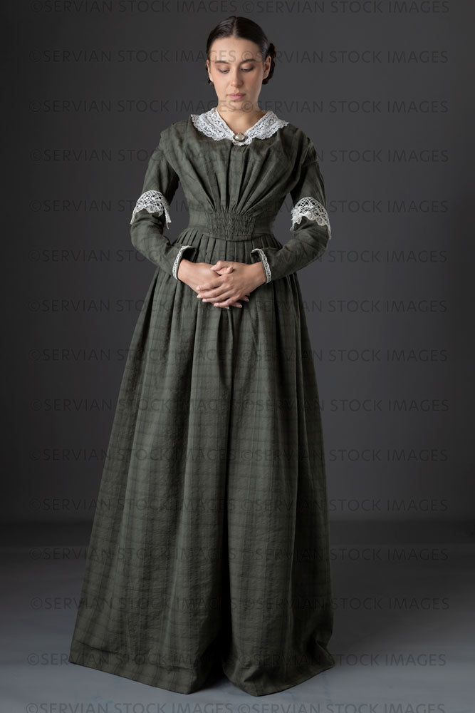 Victorian working class woman in dark green bodice and skirt (Sarah 1133)