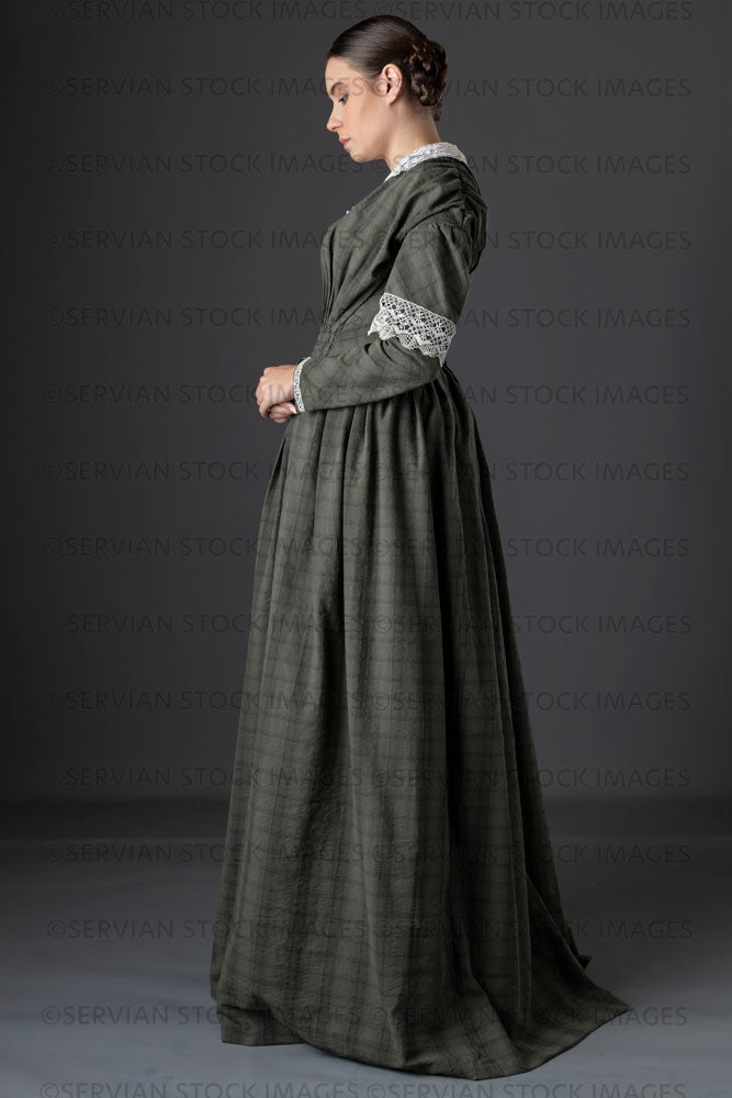Victorian working class woman in dark green bodice and skirt (Sarah 1142)