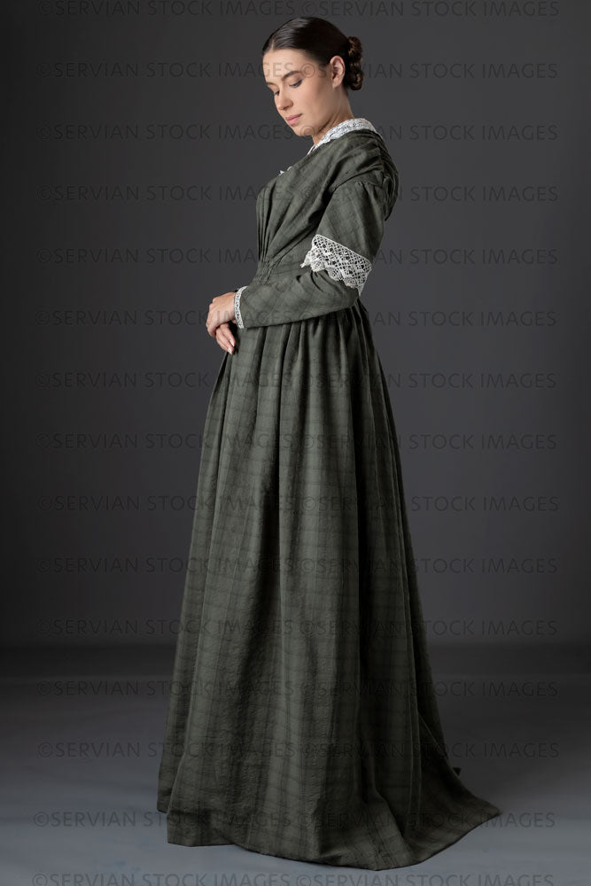 Victorian working class woman in dark green bodice and skirt (Sarah 1144)