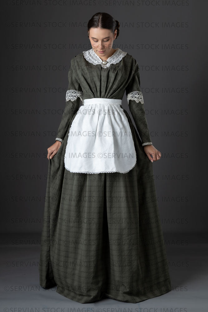 Victorian working class woman in dark green bodice and skirt (Sarah 1157)