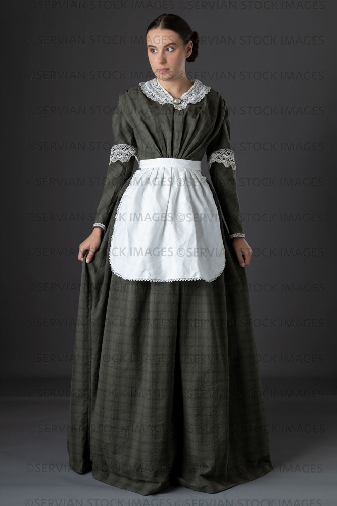 Victorian working class woman in dark green bodice and skirt (Sarah 1158)