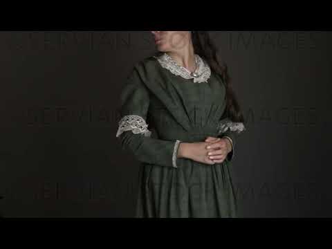 Victorian woman with her hair out and wearing a dark green checked bodice and skirt    (Sarah 1709)