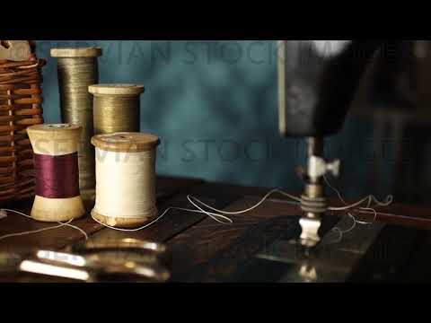 Vintage sewing equipment on an antique sewing machine  (3090)