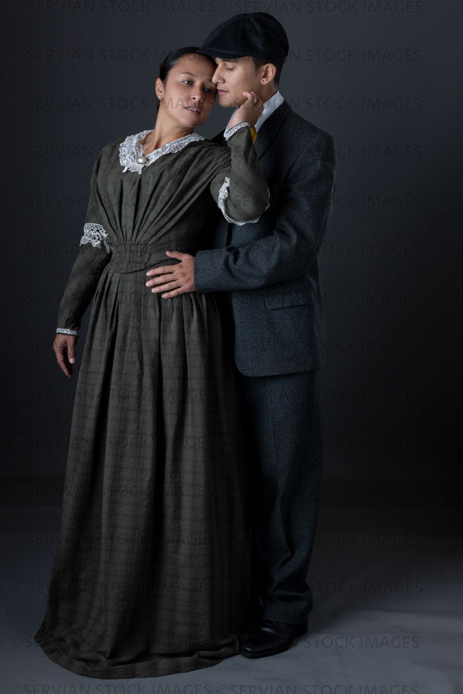 Working class Victorian couple against a grey backdrop (Sylvia and Lukas 1431)