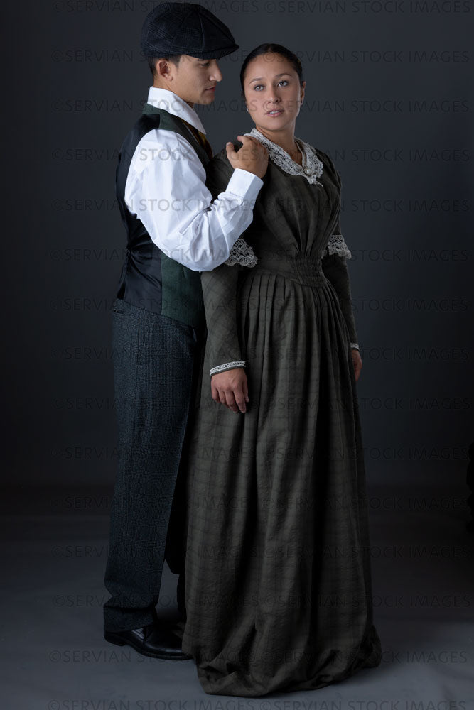 Working class Victorian couple against a grey backdrop (Sylvia and Lukas 1441)