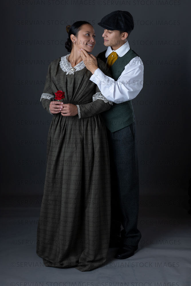 Working class Victorian couple against a grey backdrop (Sylvia and Lukas 1450)