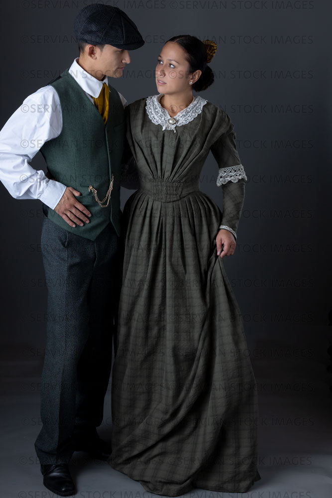 Working class Victorian couple against a grey backdrop (Sylvia and Lukas 1475)